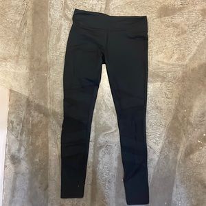 Fabletics black leggings with sheer detail